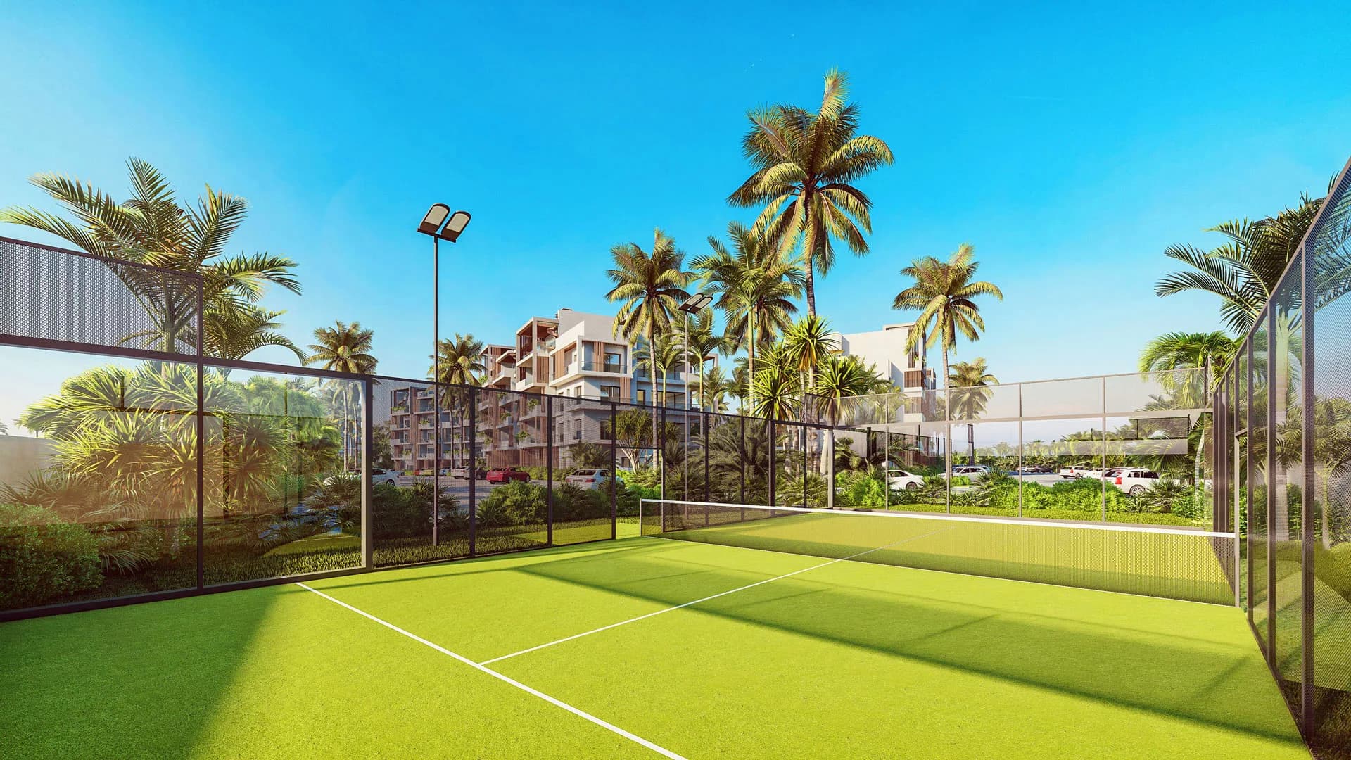 Padel court with the complex's buildings behind