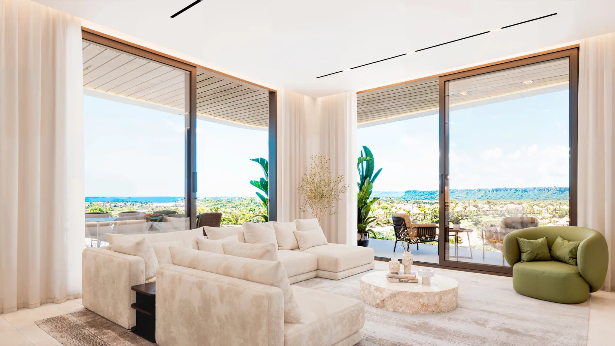 Living room with floor-to-ceiling windows onto the terrace
