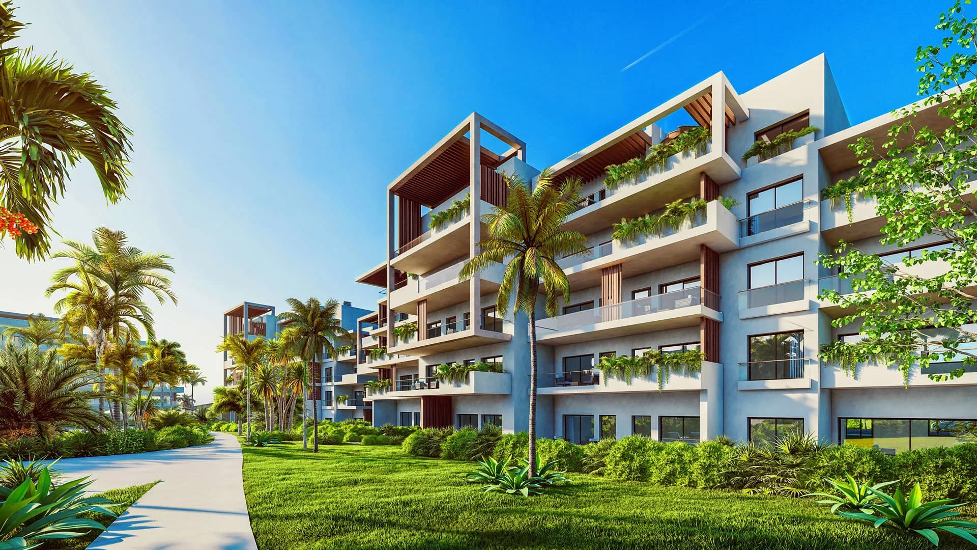 Facade of one of the blocks, with planted terraces and the footpath