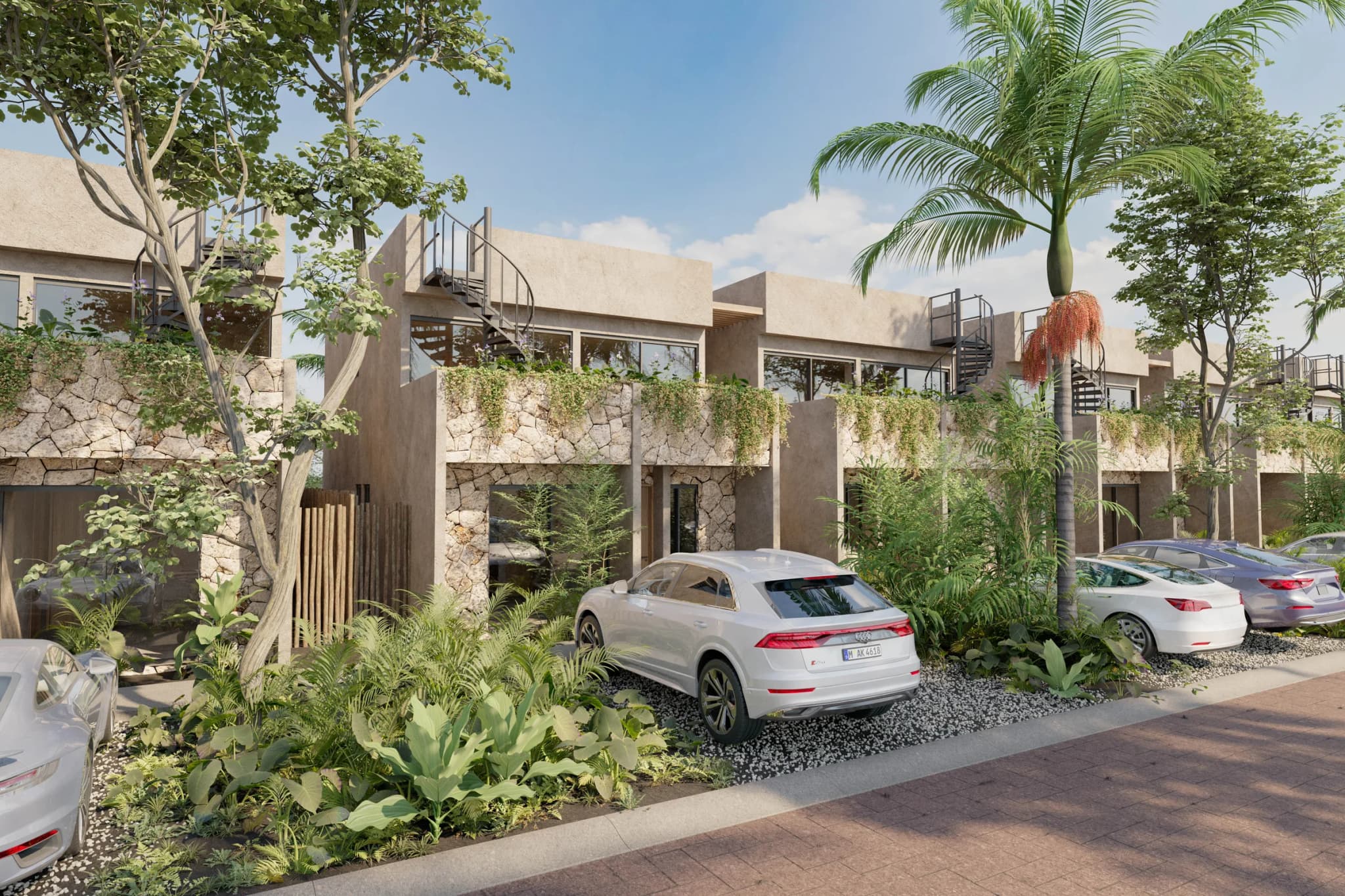 Kaoni homes with front gardens and parking in front of each building