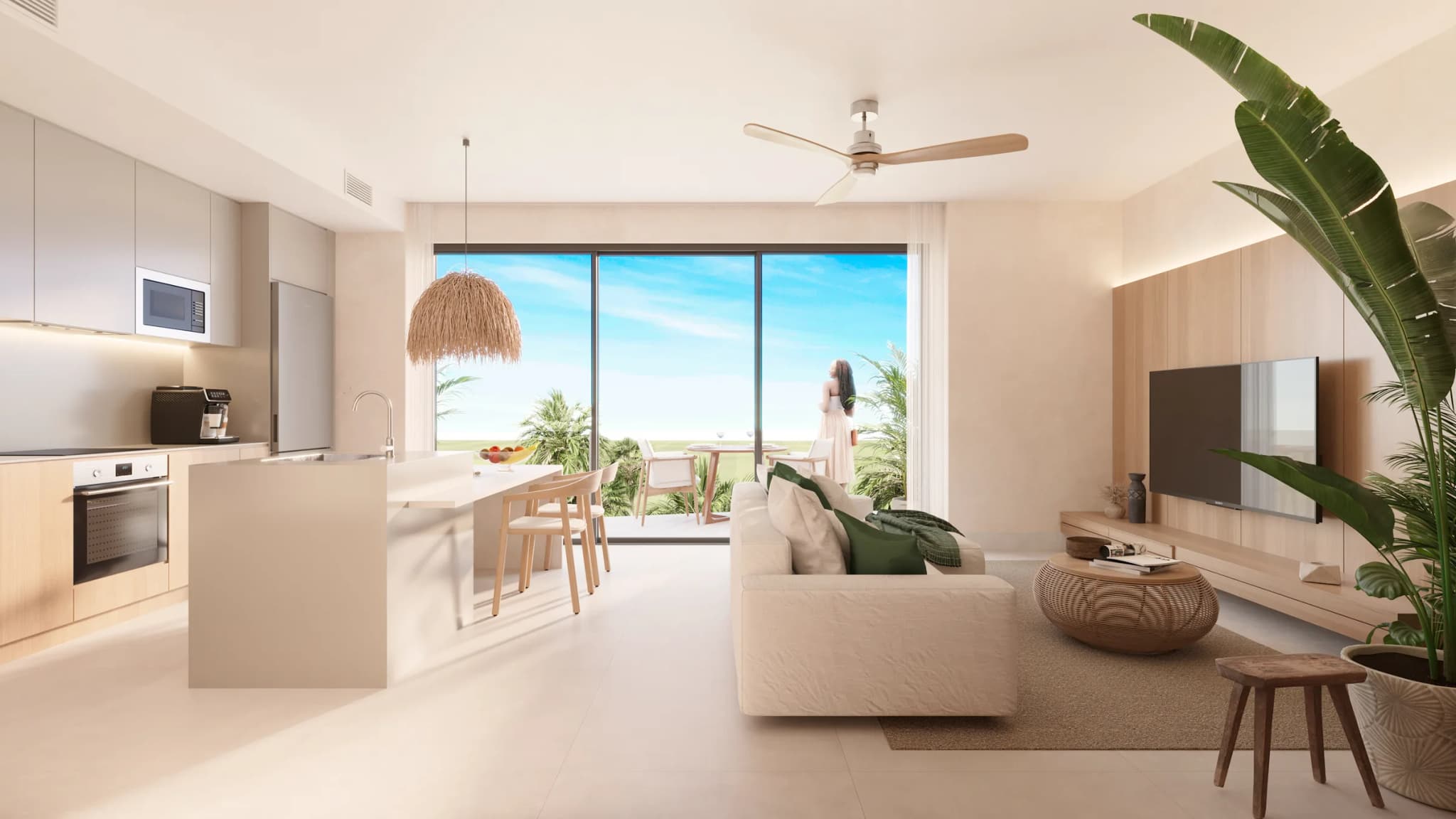 Sala y cocina abiertas a la terraza en un apartamento